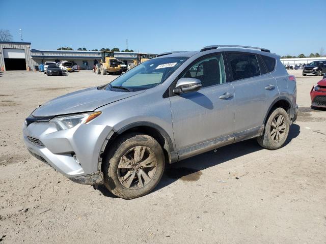TOYOTA RAV4 XLE 2016 with VIN 2T3WFREV6GW253122 - Photo from auction