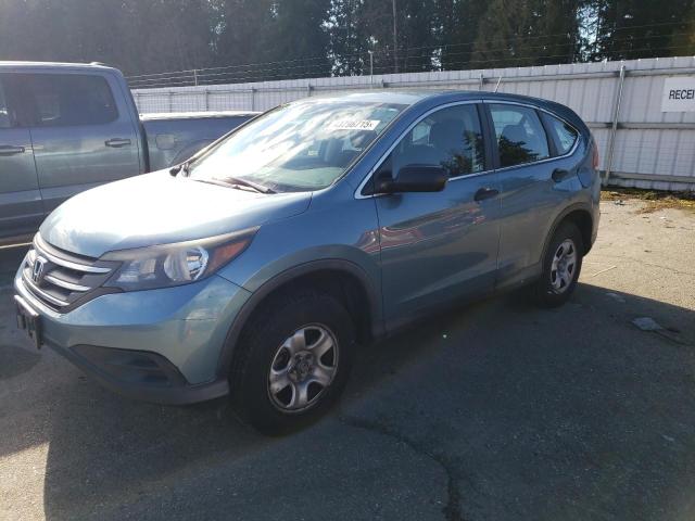 HONDA CR-V LX 2014 with VIN 2HKRM4H32EH718869 - Photo from auction