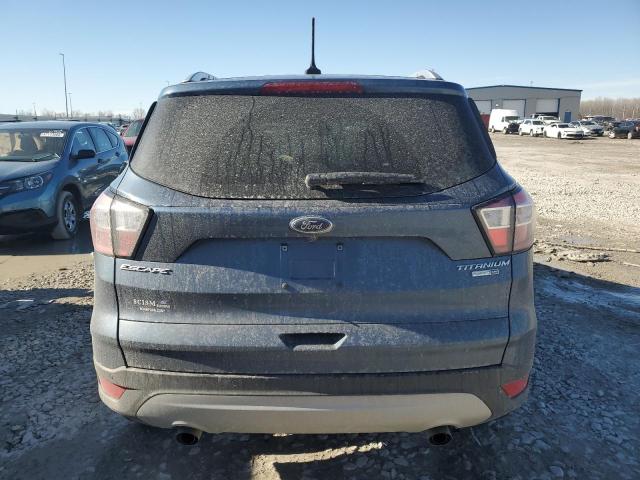 Photo 6 from auction – 2018 FORD ESCAPE TIT with VIN 1FMCU9J95JUB12754