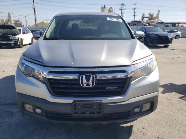 Photo 5 from auction – 2018 HONDA RIDGELINE with VIN 5FPYK2F16JB003388