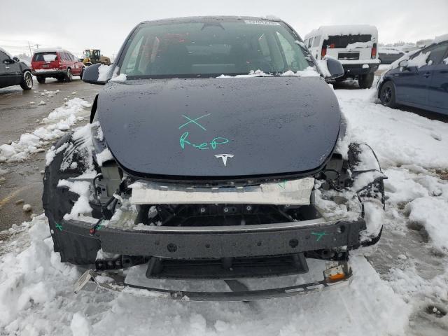 Photo 5 from auction – 2023 TESLA MODEL Y with VIN 7SAYGAEE4PF698636