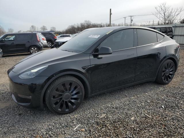 TESLA MODEL Y 2022 with VIN 7SAYGDEF4NF546184 - Photo from auction