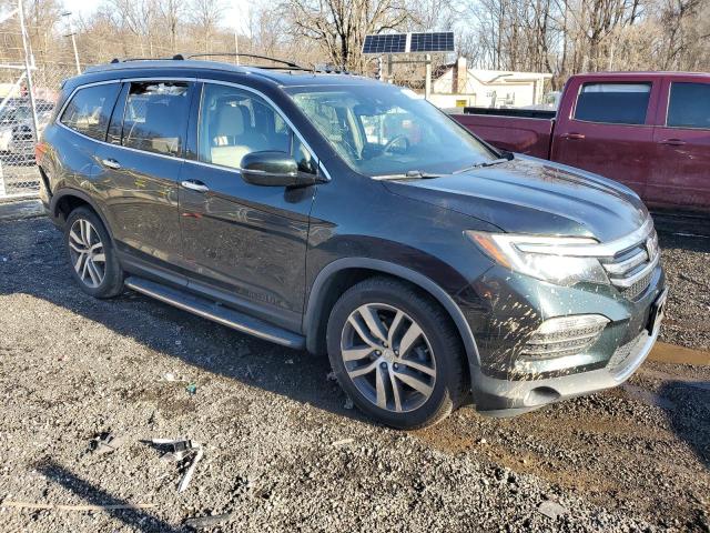 Photo 4 from auction – 2017 HONDA PILOT ELIT with VIN 5FNYF6H04HB071482