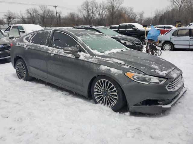 Photo 4 from auction – 2017 FORD FUSION TIT with VIN 3FA6P0D98HR376932