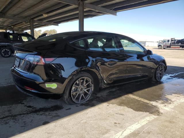 Photo 3 from auction – 2023 TESLA MODEL 3 with VIN 5YJ3E1EA4PF454043