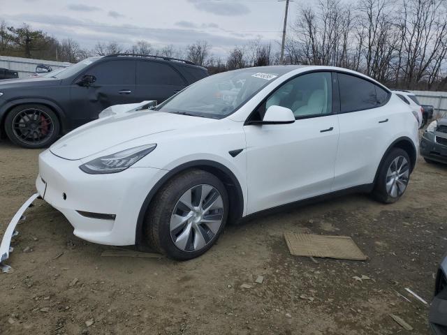 TESLA MODEL Y 2023 with VIN 7SAYGDEEXPF615731 - Photo from auction