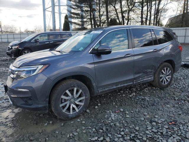 HONDA PILOT EXL 2021 with VIN 5FNYF6H54MB022899 - Photo from auction