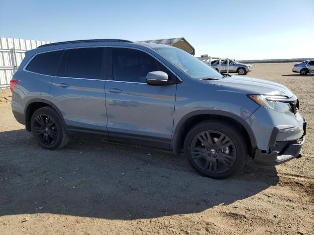 Photo 4 from auction – 2022 HONDA PILOT SE with VIN 5FNYF5H26NB029354