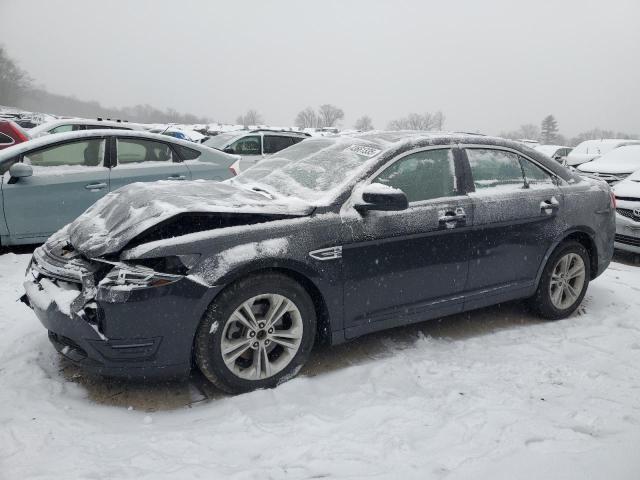 FORD TAURUS SEL 2015 with VIN 1FAHP2E84FG101976 - Photo from auction