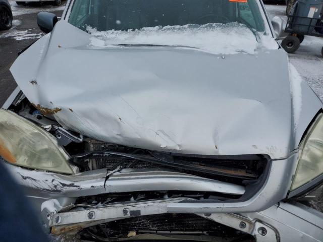 Фото 12 с аукциона – 2004 HONDA PILOT с VIN 2HKYF18524H542846