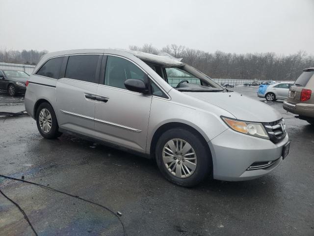 Photo 4 from auction – 2014 HONDA ODYSSEY LX with VIN 5FNRL5H26EB056972