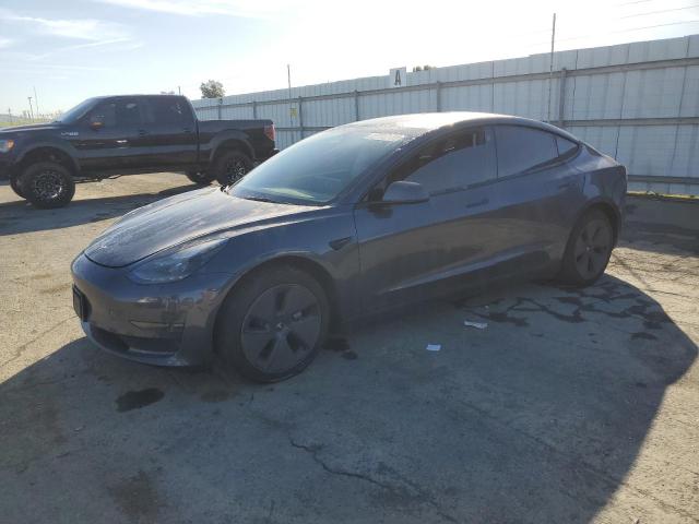 TESLA MODEL 3 2023 with VIN 5YJ3E1EA3PF697472 - Photo from auction