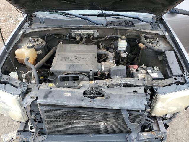 Photo 12 from auction – 2009 FORD ESCAPE LIM with VIN 1FMCU04G59KC10728