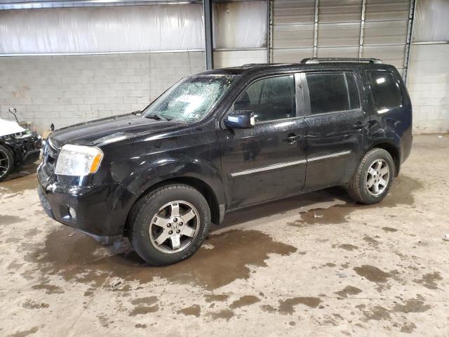 HONDA PILOT TOUR 2010 with VIN 5FNYF4H97AB030532 - Photo from auction