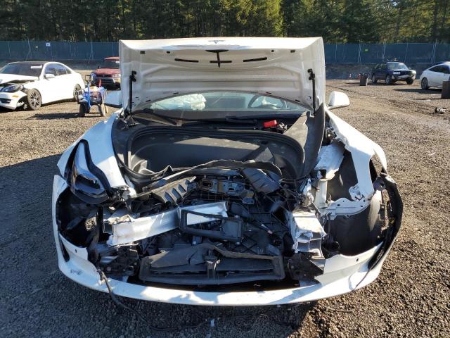 Снимка 5 от търг – 2021 TESLA MODEL 3 с VIN 5YJ3E1EA5MF928934