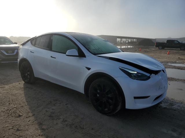 Снимка 4 от търг – 2024 TESLA MODEL Y с VIN 7SAYGDED0RA311315