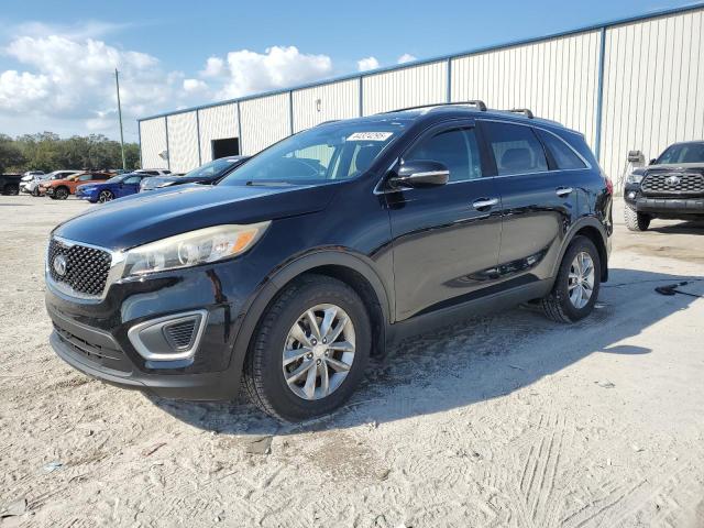 KIA SORENTO LX 2016 with VIN 5XYPG4A33GG102651 - Photo from auction