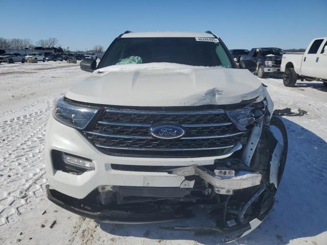 Foto 5 de la subasta – 2021 FORD EXPLORER X con VIN 1FMSK8DH1MGB02093