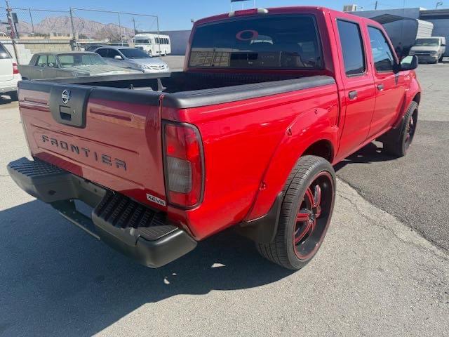 Photo 4 from auction – 2004 NISSAN FRONTIER C with VIN 1N6ED27T74C407112