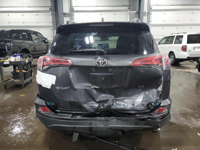 Photo 6 from auction – 2018 TOYOTA RAV4 LE with VIN 2T3ZFREV0JW520923