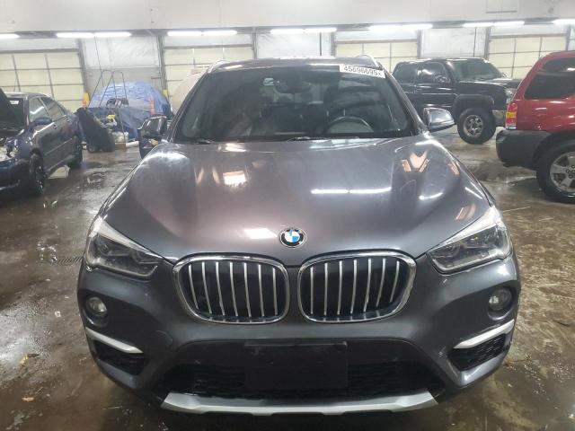 Photo 5 from auction – 2017 BMW X1 XDRIVE2 with VIN WBXHT3Z3XH4A55770