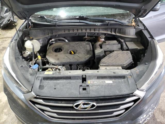 Photo 12 from auction – 2018 HYUNDAI TUCSON SE with VIN KM8J2CA48JU631537