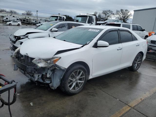 TOYOTA CAMRY L 2014 with VIN 4T1BF1FK6EU404633 - Photo from auction