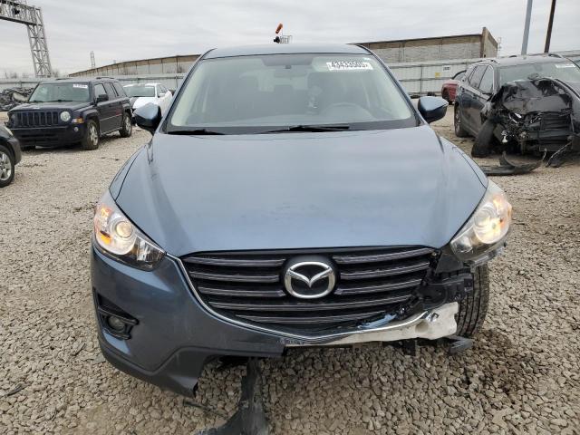 Photo 5 from auction – 2016 MAZDA CX-5 TOURI with VIN JM3KE2CY7G0776117
