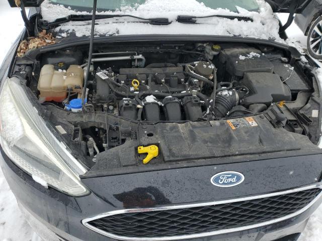Photo 11 from auction – 2015 FORD FOCUS SE with VIN 1FADP3F26FL346445