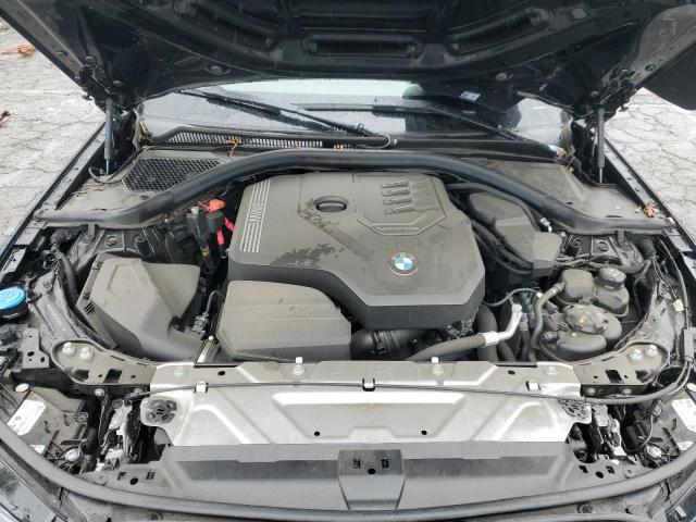 Photo 11 from auction – 2023 BMW 330I with VIN 3MW69FF02P8D60443