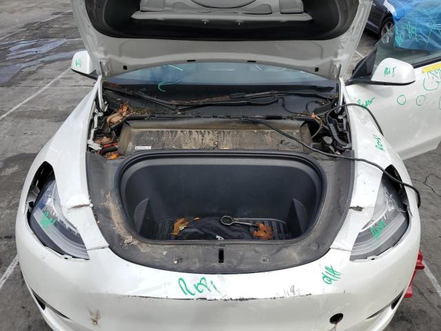 Photo 11 from auction – 2021 TESLA MODEL Y with VIN 5YJYGAEE6MF271967
