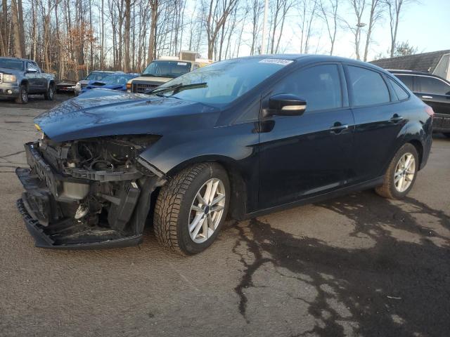 FORD FOCUS SE 2016 with VIN 1FADP3F22GL303268 - Photo from auction