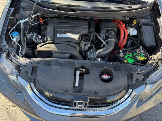 Photo 7 from auction – 2014 HONDA CIVIC HYBR with VIN 19XFB4F27EE2011