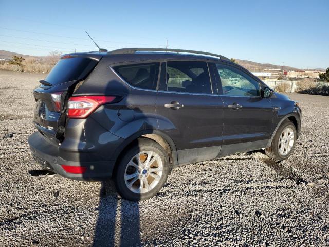 Photo 3 from auction – 2018 FORD ESCAPE SE with VIN 1FMCU9GD8JUC61154
