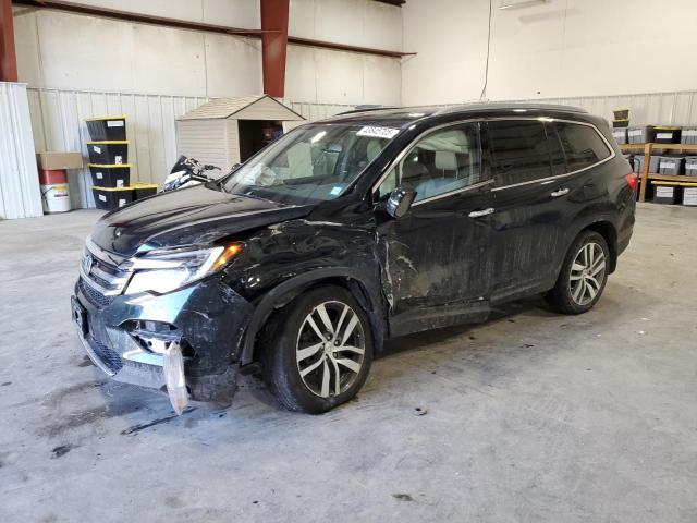 HONDA PILOT TOUR 2017 with VIN 5FNYF6H93HB001969 - Photo from auction
