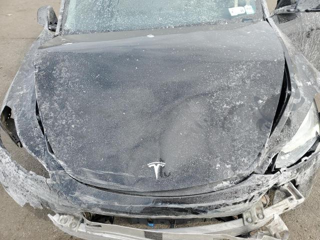 Снимка 11 от търг – 2023 TESLA MODEL Y с VIN 7SAYGDEE0PF690275