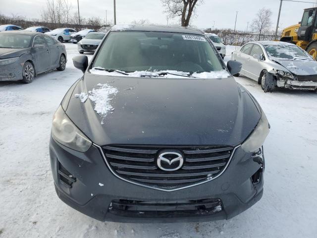 Photo 5 from auction – 2016 MAZDA CX-5 SPORT with VIN JM3KE2BE4G0829900