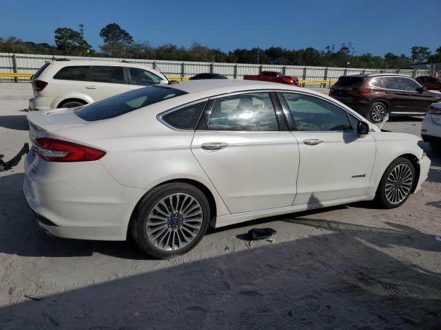 Photo 3 from auction – 2017 FORD FUSION TIT with VIN 3FA6P0RU4HR383910