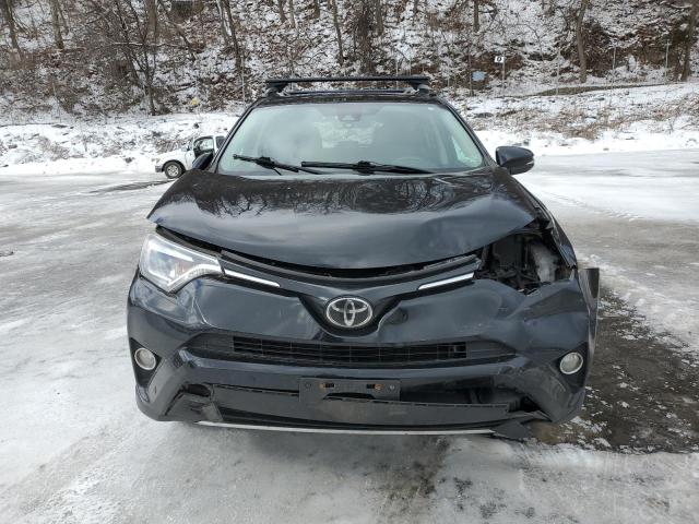 Photo 5 from auction – 2017 TOYOTA RAV4 LIMIT with VIN 2T3DFREV7HW581268