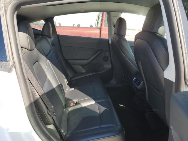 Photo 11 from auction – 2022 TESLA MODEL Y with VIN 7SAYGDEF5NF406452