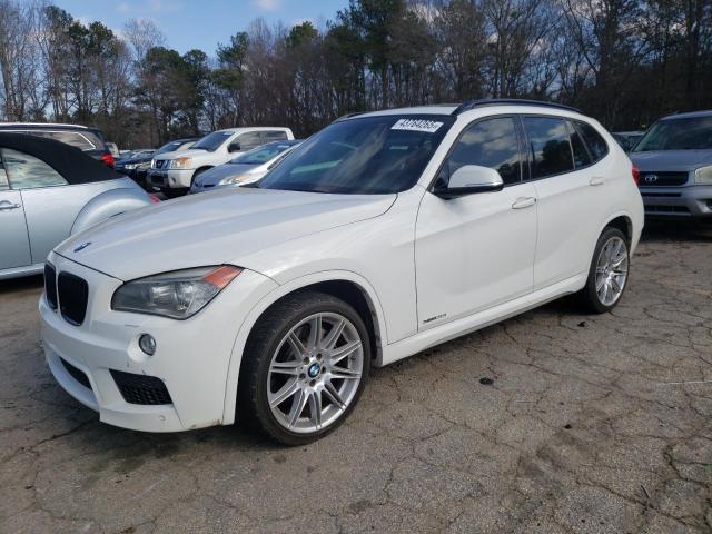 BMW X1 XDRIVE3 2013 with VIN WBAVM5C5XDVV90213 - Photo from auction