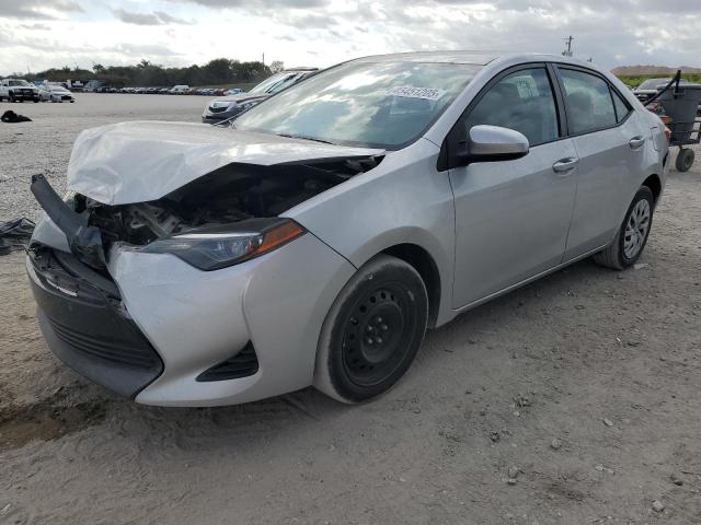 TOYOTA COROLLA L 2018 with VIN 5YFBURHE7JP753095 - Photo from auction