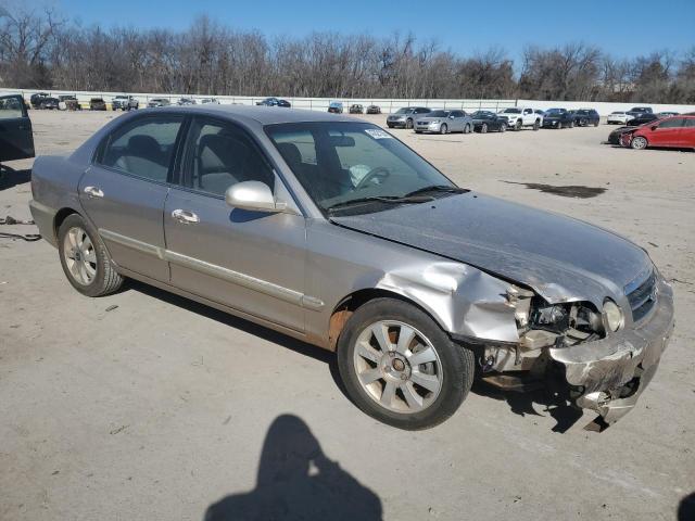 Photo 4 from auction – 2004 KIA OPTIMA LX with VIN KNAGD128245342583