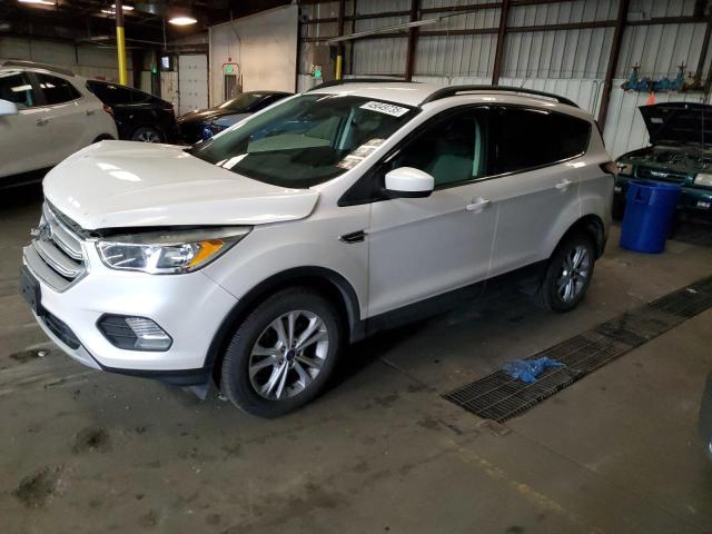 FORD ESCAPE SE 2018 with VIN 1FMCU9GD2JUC59917 - Photo from auction