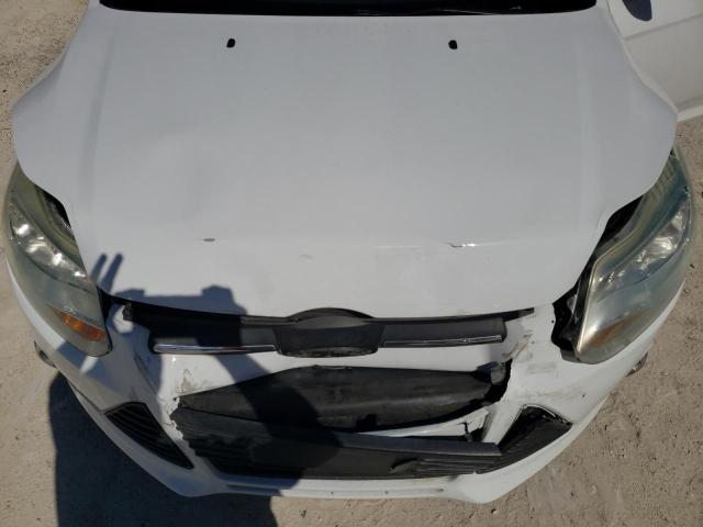 Photo 11 from auction – 2013 FORD FOCUS SE with VIN 1FADP3K20DL152979
