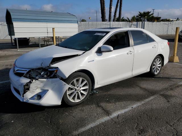 TOYOTA CAMRY HYBR 2012 with VIN 4T1BD1FKXCU021040 - Photo from auction