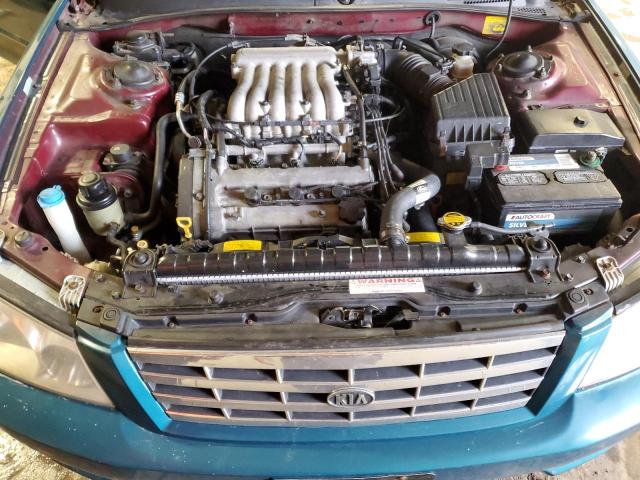 Photo 11 from auction – 2002 KIA OPTIMA MAG with VIN KNAGD128925099335