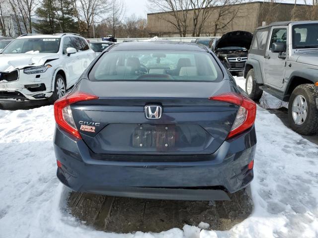 Photo 6 from auction – 2018 HONDA CIVIC LX with VIN 19XFC2F52JE009372
