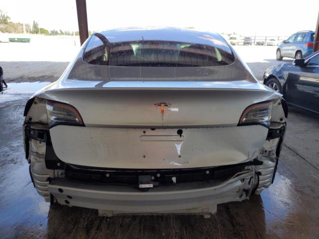 Снимка 6 от търг – 2018 TESLA MODEL 3 с VIN 5YJ3E1EA9JF022006