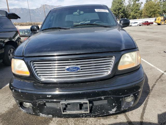 Photo 5 from auction – 2003 FORD F150 SUPER with VIN 1FTRW07313KB66008